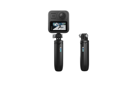Trípode GoPro Shorty desplegado en superficie plana para tomas estables