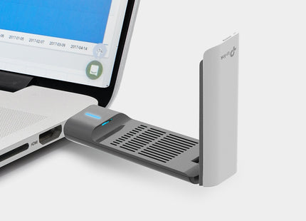 Packaging y contenido completo del adaptador inalámbrico TP-Link Archer TX20UH