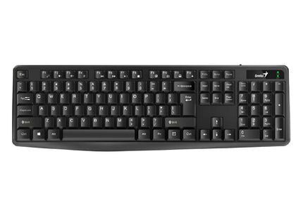 Teclado Genius KB-117 en uso sobre escritorio de oficina