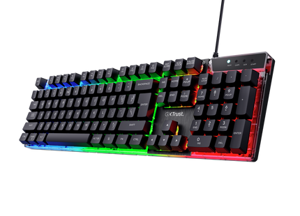 Teclado gaming Trust GXT 835 en setup gamer con iluminación LED activada