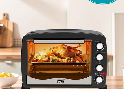 Horno eléctrico Winning Star ST-2351 en funcionamiento con luz interior encendida