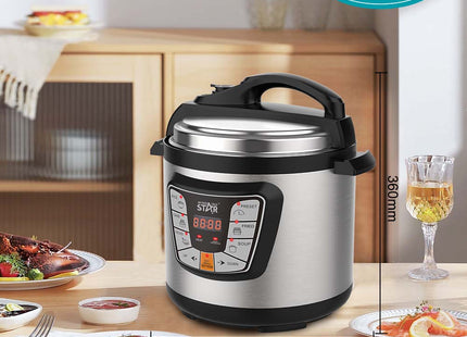 Olla multiusos en uso cocinando alimentos vista superior