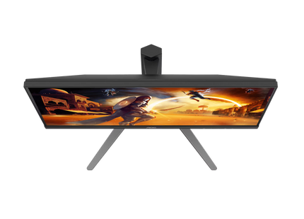 Vista del monitor AOC 27G4H en setup gaming completo con teclado y mouse