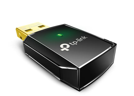 TP-Link Archer T2U conectado a puerto USB de computadora portátil
