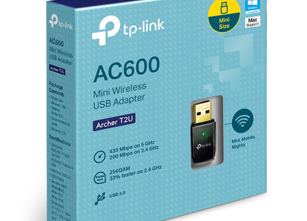 TP-Link Archer T2U AC600 sobre escritorio junto a router inalámbrico