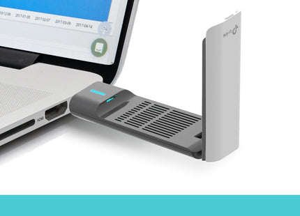 Adaptador WiFi dual band TX50UH TP-Link con antenas plegadas vista compacta