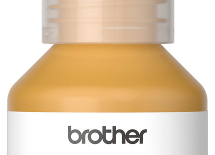 Botella tinta Brother BTD100Y amarillo original vista frontal con etiqueta