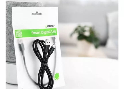 Cable UGREEN US184 enrollado vista lateral mostrando flexibilidad