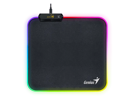 Mouse Pad RGB Genius GX-Pad 260S con iluminación LED multicolor encendida sobre escritorio